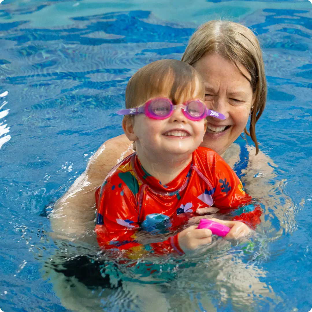 Mum and child in the pool